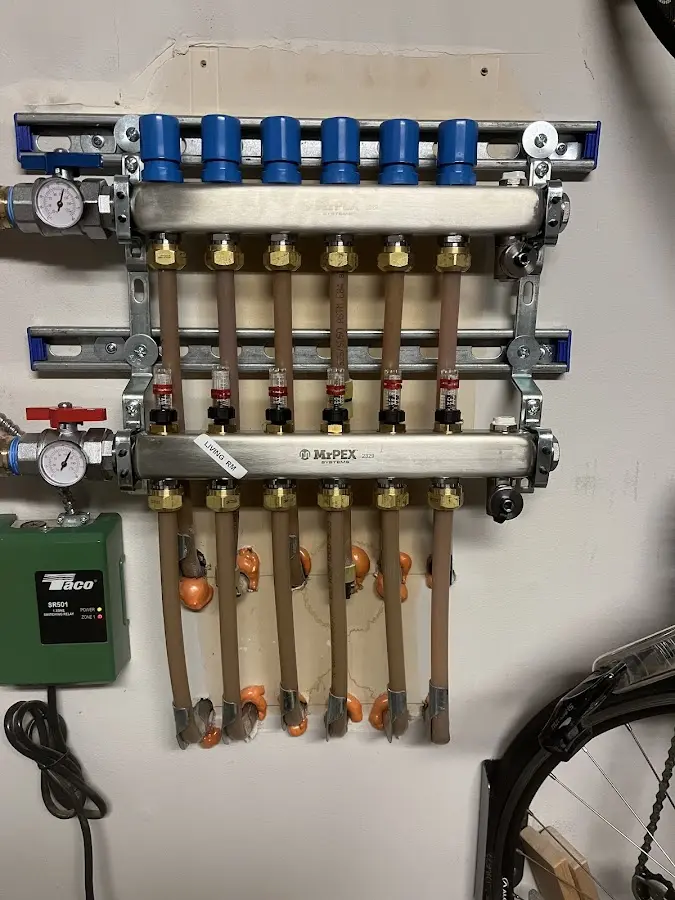 Plumber performing Water Heater Repair at a residential property in Orem